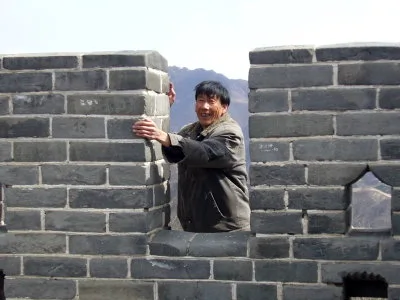Vendor at Badaling avoiding the entrance fee by scaling the wall