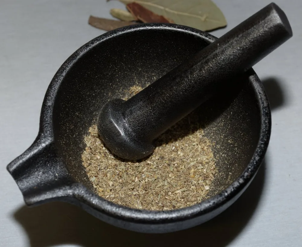 Ground spices in mortar and pestle